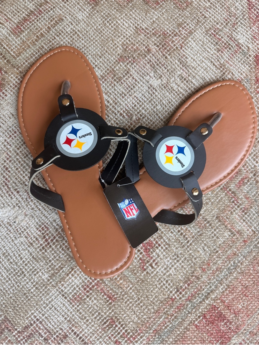 NFL Women's Black Strap Brown Footbed Sandals with Team Medallions